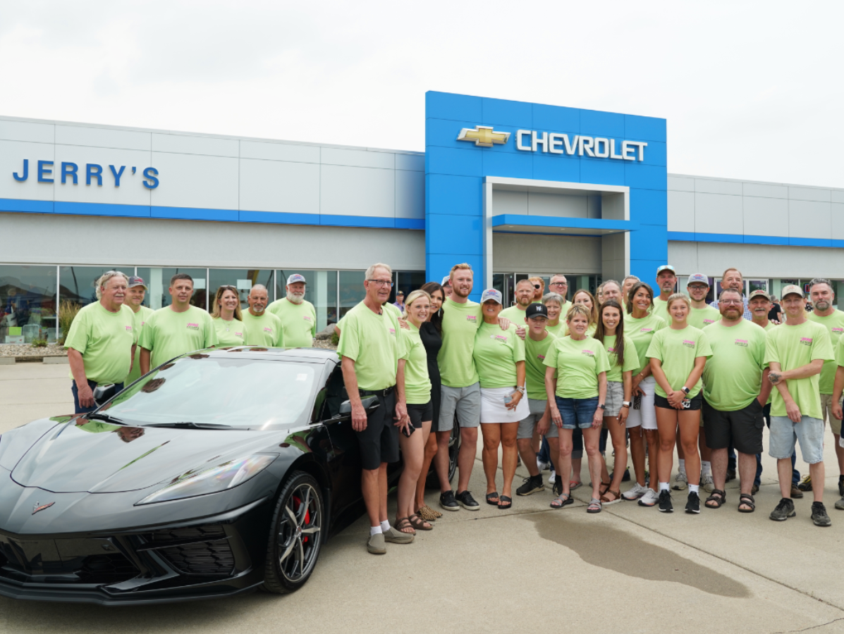group photo outside of dealership at Jerry's Auto Group in Lennox SD